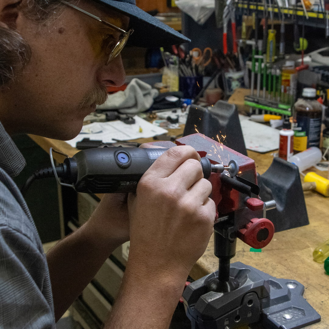 Gunsmith working at the bench - Elk River Guns