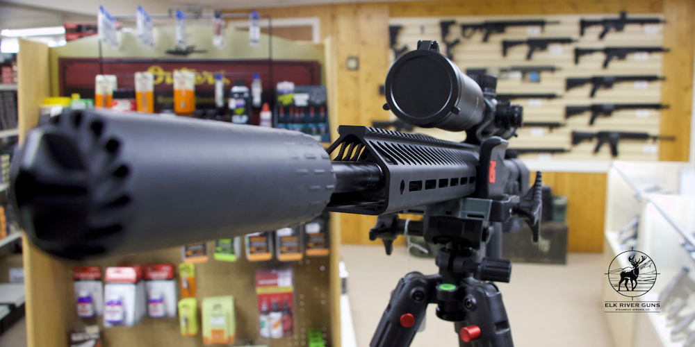 Guides & Articles Rifle with suppressor